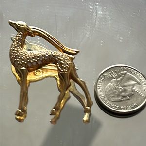 Golden color gazelle brooch